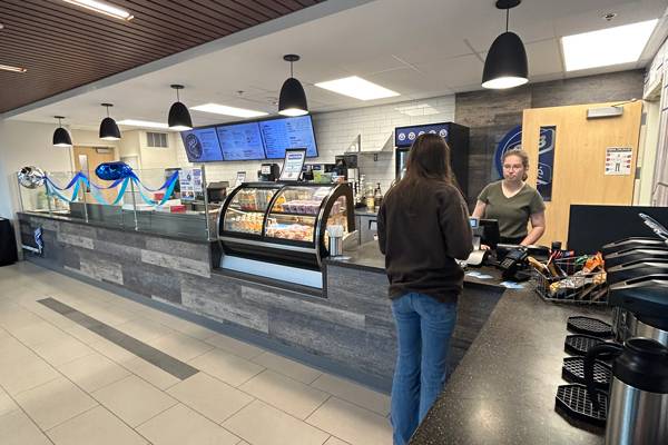 Student and cashier at 333 Cafe